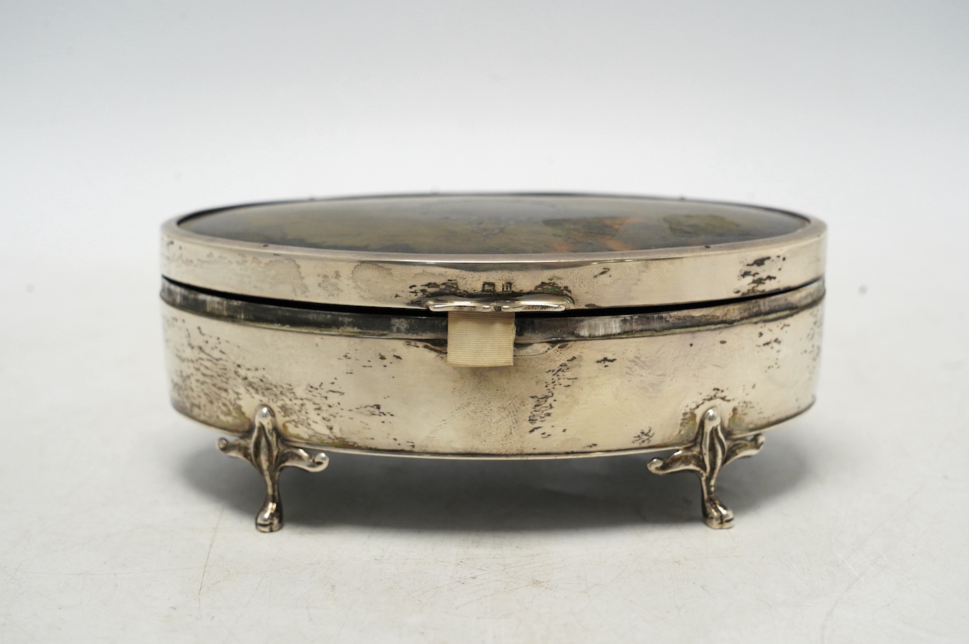 A George V silver and tortoiseshell mounted oval manicure box, E.S. Barnsley & Co Ltd, Birmingham, 1912, 13.5cm, incomplete. Condition - poor